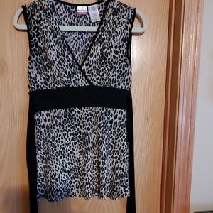 Super cute top that ties in the back